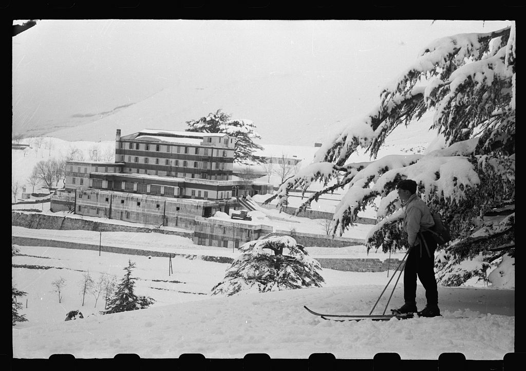 grand-hotel-des-cedres-among-cedars-of-lebanon-in-snow-skier-in-foreground-1024